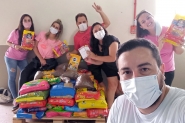 Grupo promove evento e doa 200kg de ra��o e dinheiro para Agapa