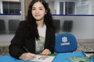 Ex-aluna da Rede Municipal de Gaspar lan�a livro sobre preserva��o dos oceanos